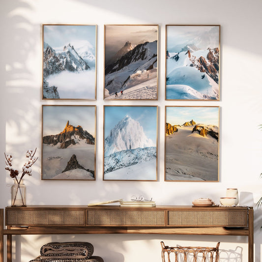 Modern living room with a gallery wall of six framed Chamonix mountain landscape prints.