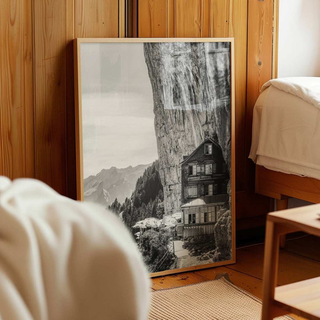 Vintage-style wall art print of Aescher Guesthouse, a unique Swiss Alps retreat built into a rock face.