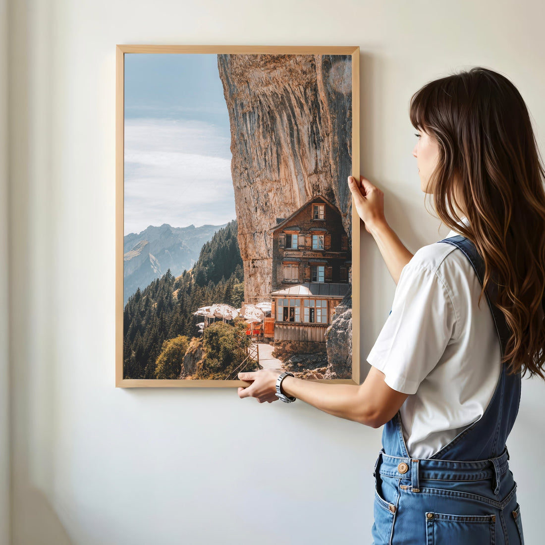 The iconic Aescher Wildkirchli guesthouse, a must-visit Swiss hiking destination with alpine views.