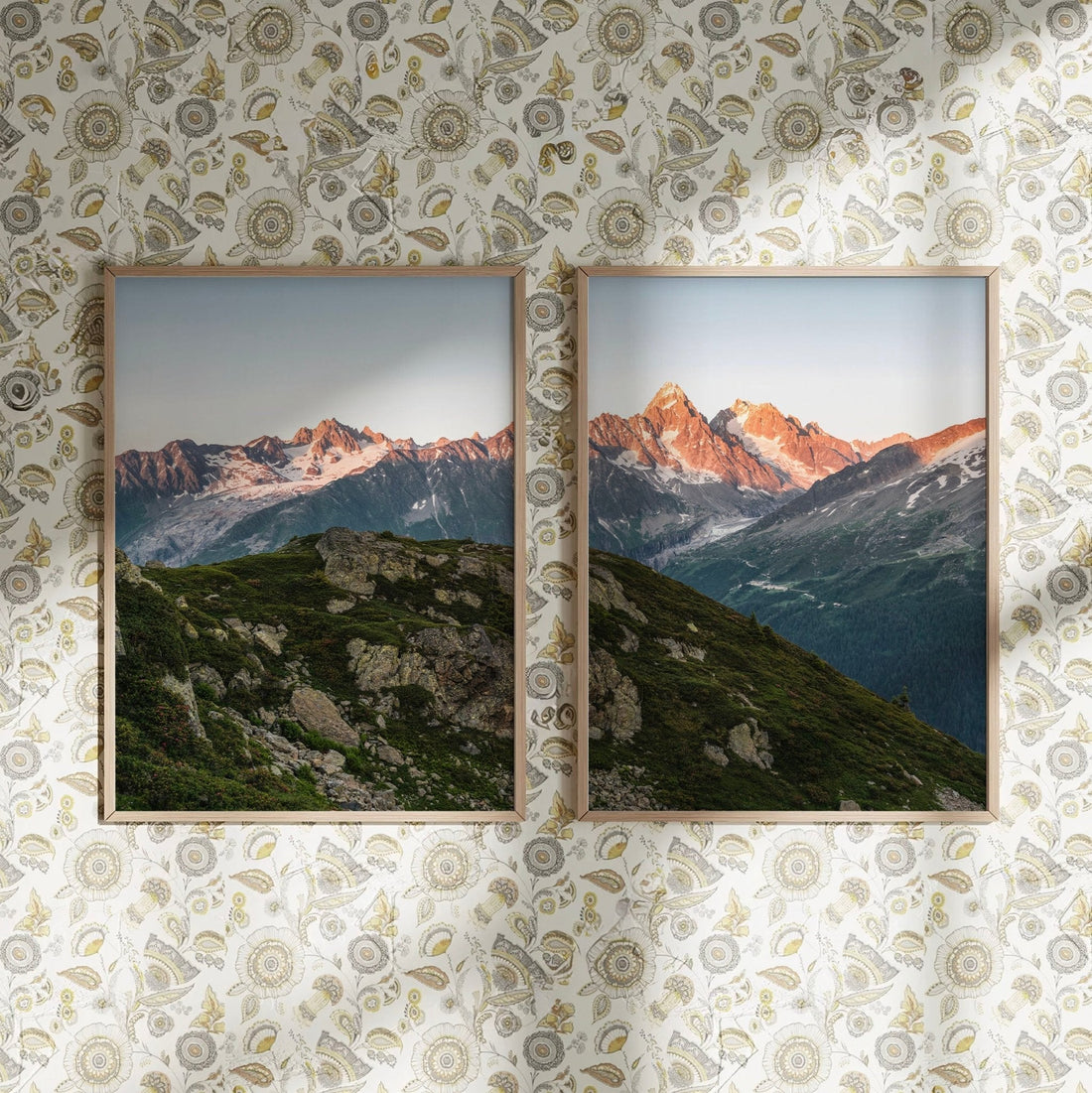 Aiguille du Chardonne landscape prints on a dark dining room wall, creating a warm and luxurious ambiance