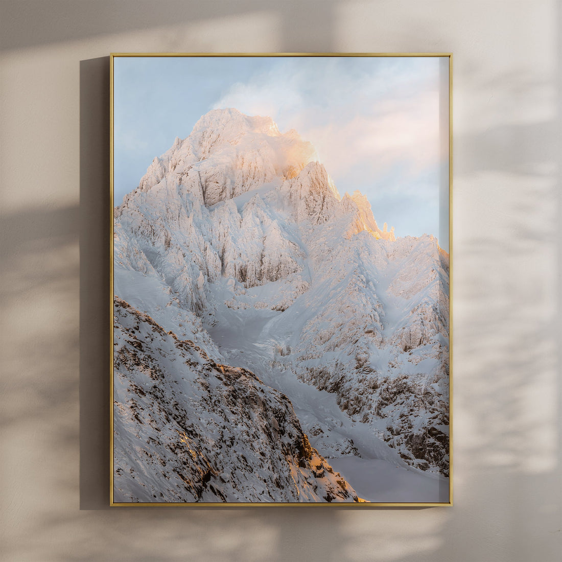 Stunning Aiguille du Chardonnet wall art featuring a golden sunrise over its snow-covered peaks.