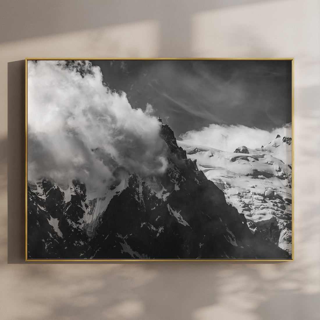 Aiguille du Midi black and white wall art print with swirling clouds over snow-capped peaks in Chamonix.