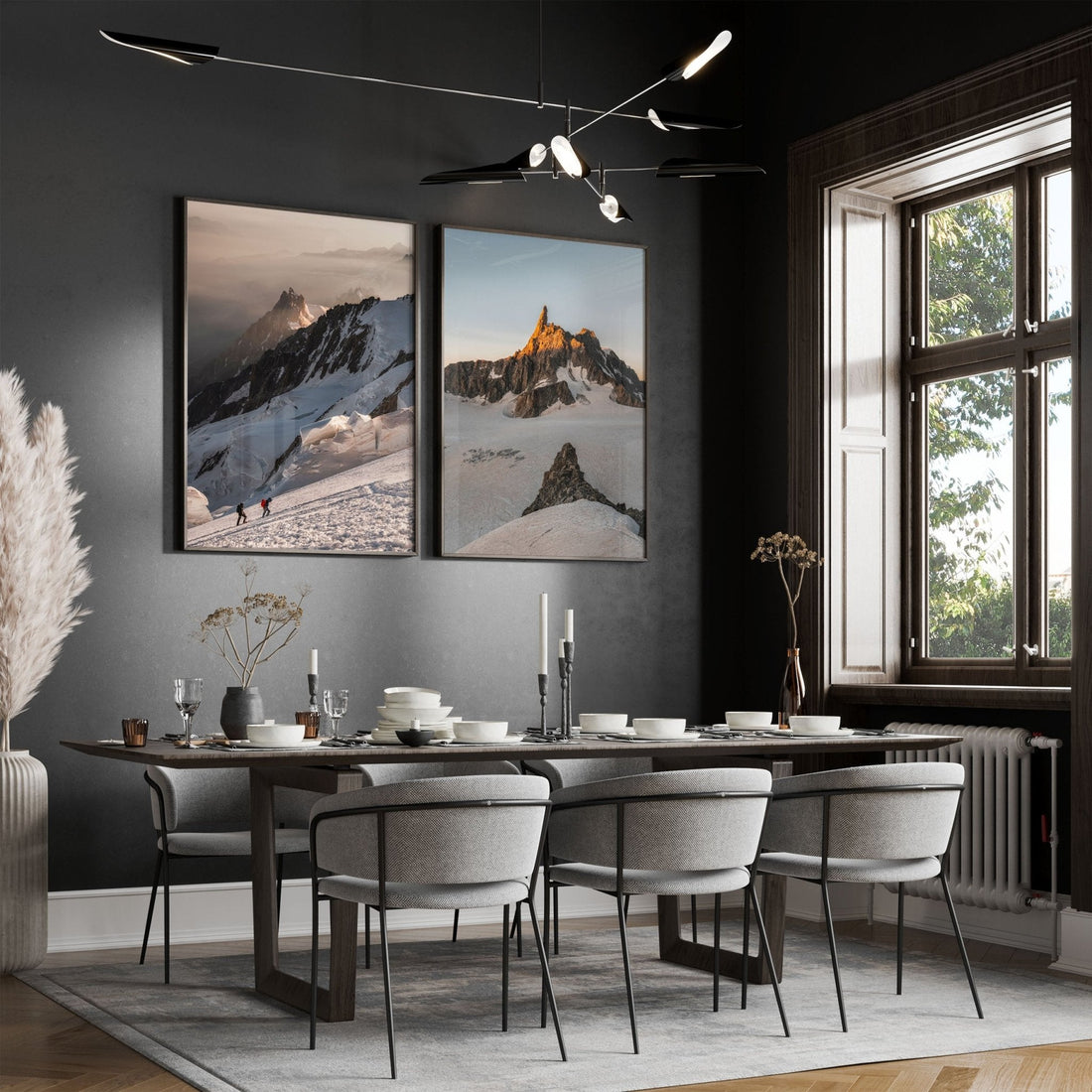 Mont Blanc climbing scene and Dent du Géant wall art in a dining room.