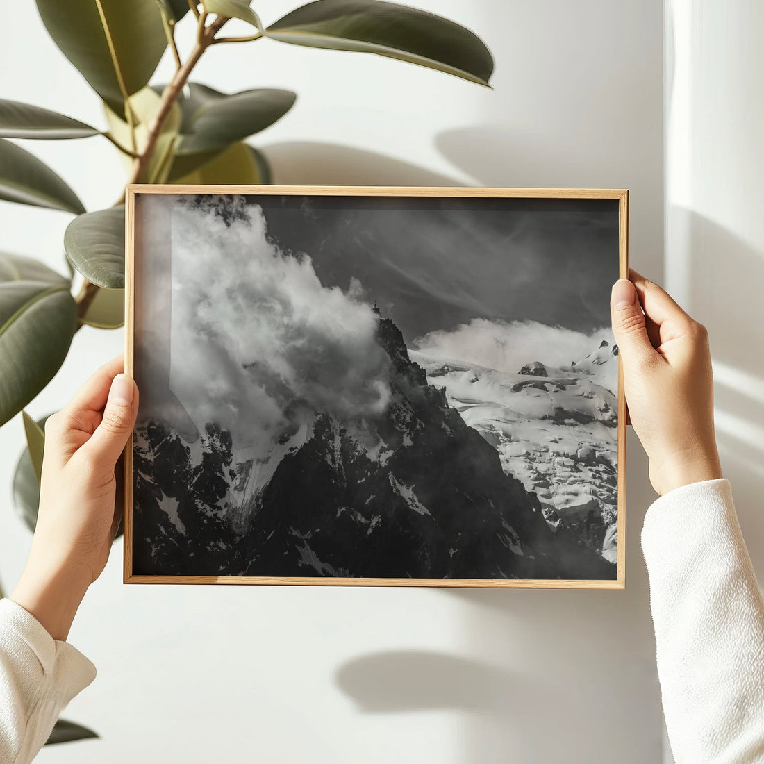 Fine art photography print of Aiguille du Midi in moody black and white with glacier textures in the French Alps.