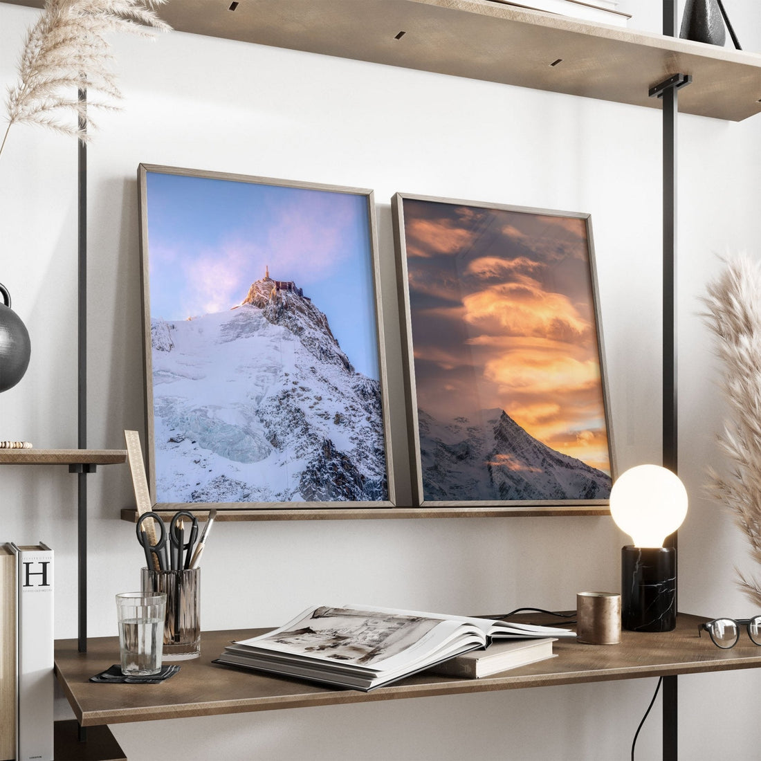 Framed Aiguille du Midi wall art displayed on a stylish wooden shelf.