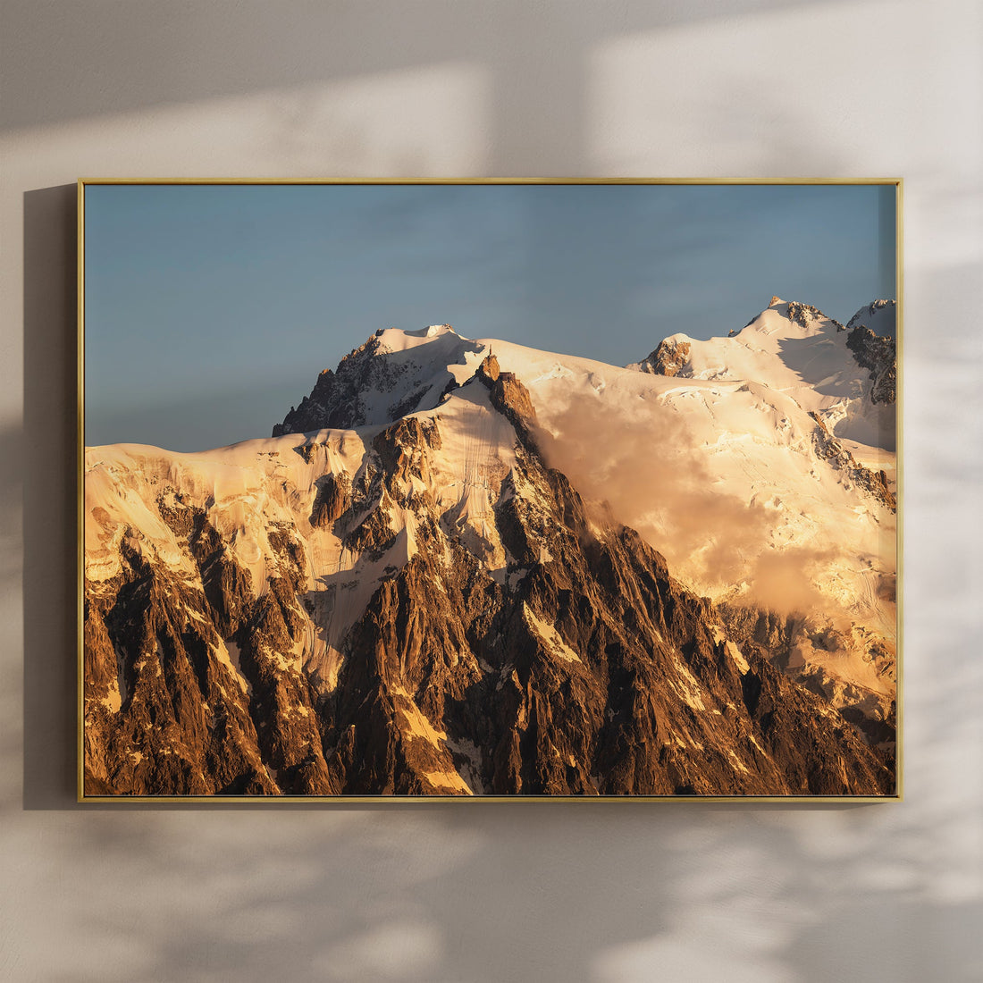 Sunrise print of Aiguille du Midi with golden light on the Mont Blanc massif, captured from Chamonix in the French Alps.