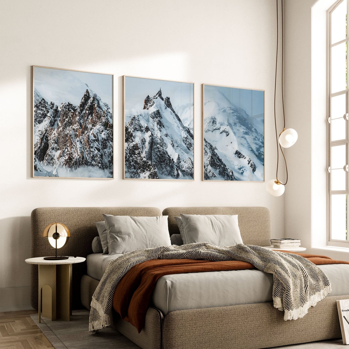 View of Aiguille du Midi with its striking snowy peak and soft clouds.