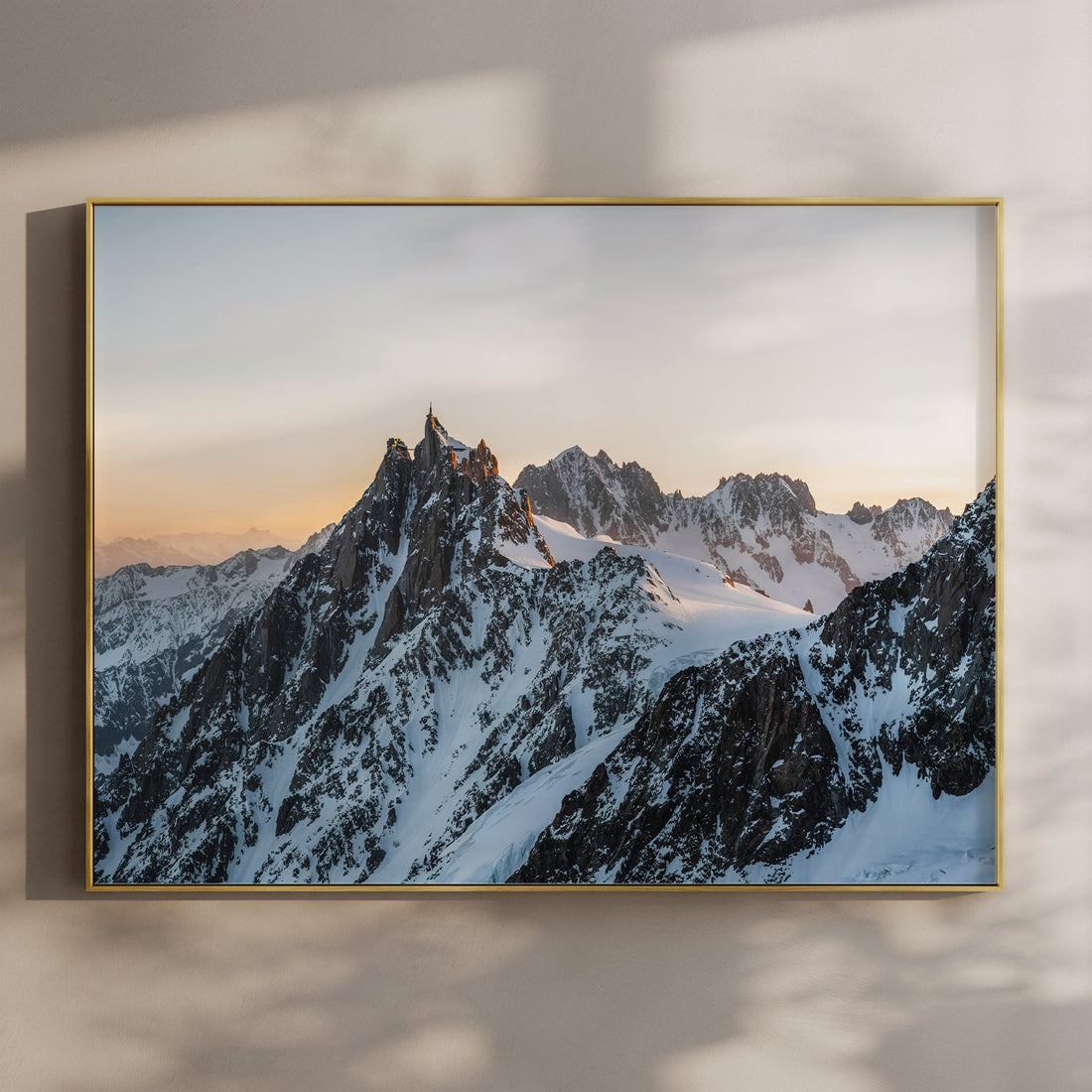 Aiguille du Midi wall art print showcasing a snowy summit at golden hour in the French Alps near Chamonix.