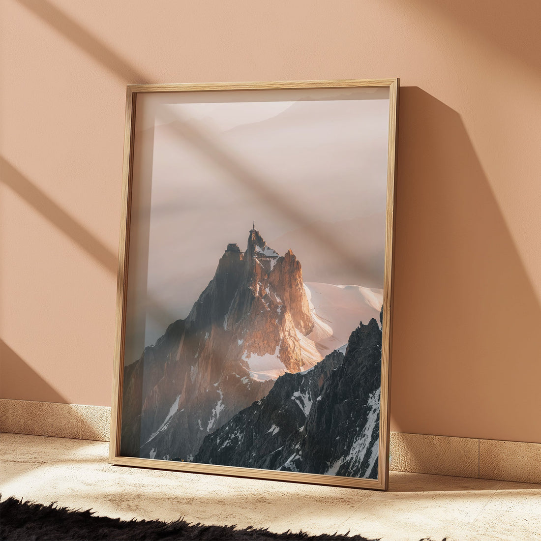 Modern mountain wall decor featuring the famous Aiguille du Midi in a moody alpine atmosphere.
