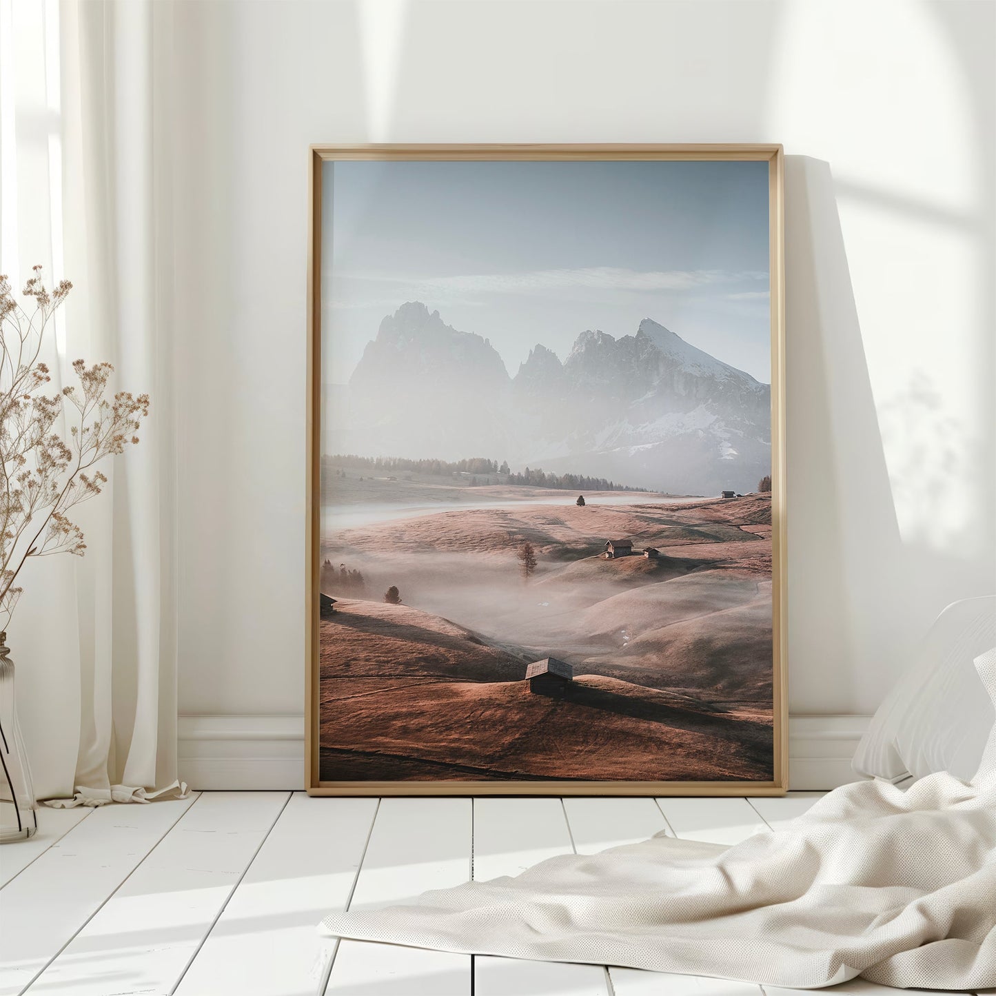 Morning light glows across Alpe di Siusi’s hills and cabins in this peaceful alpine photography print.