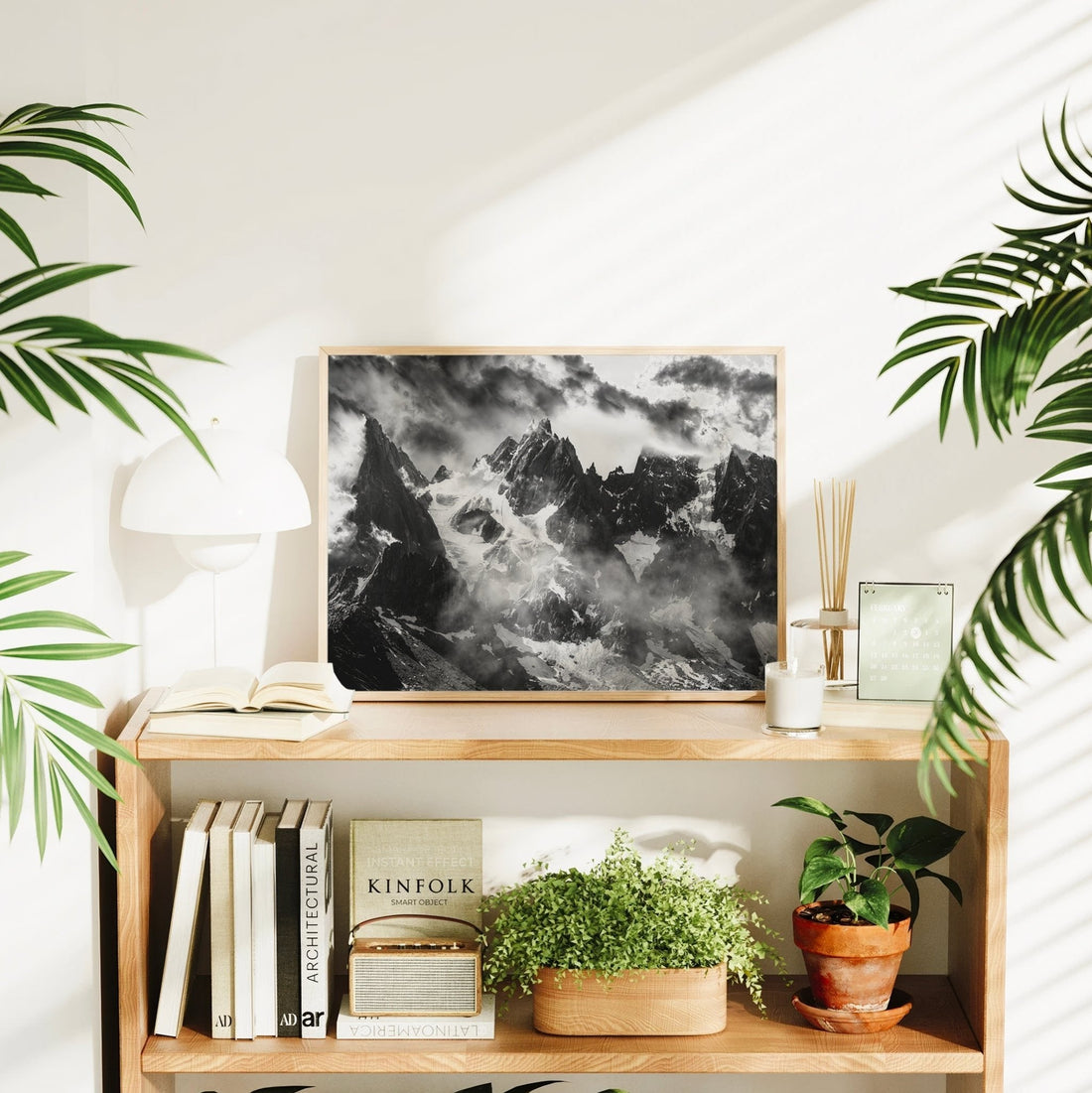 High contrast wall art print of steep rock spires and snowfields above Chamonix, France.