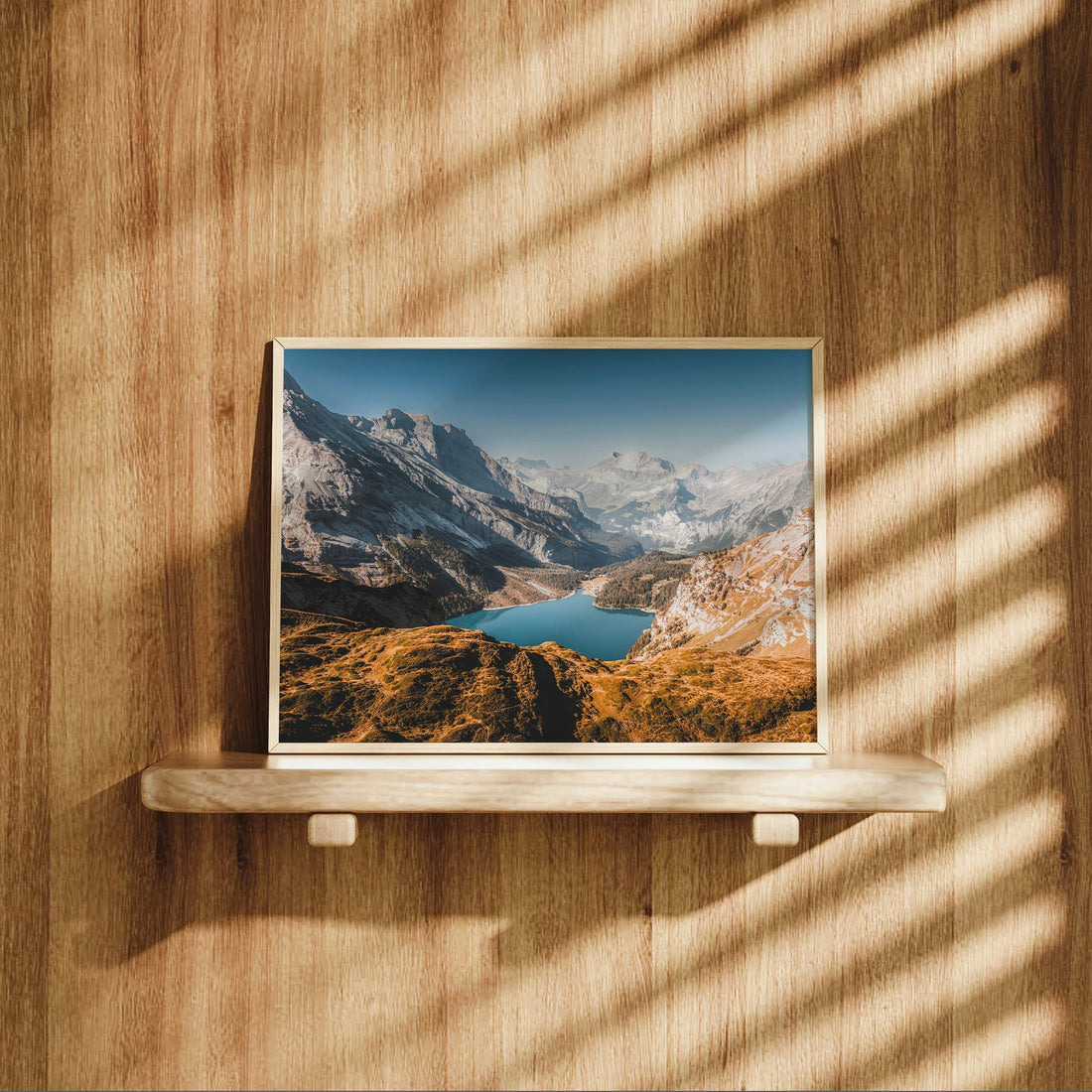 Oeschinensee landscape art print on wooden shelf in natural light