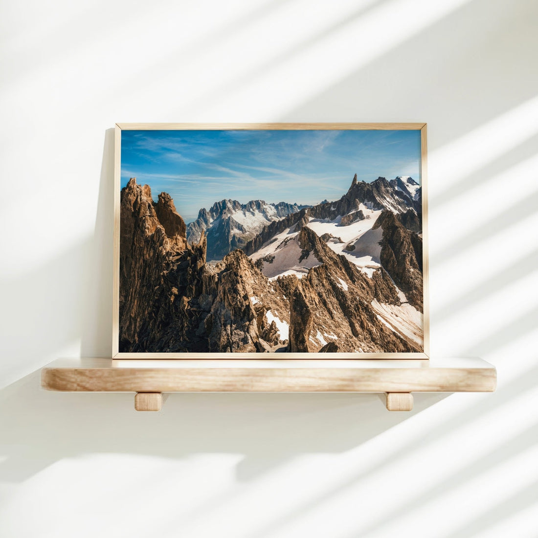 Fine art print of Aiguille d’Entrèves with sweeping glacier views and jagged peaks under a deep blue sky.