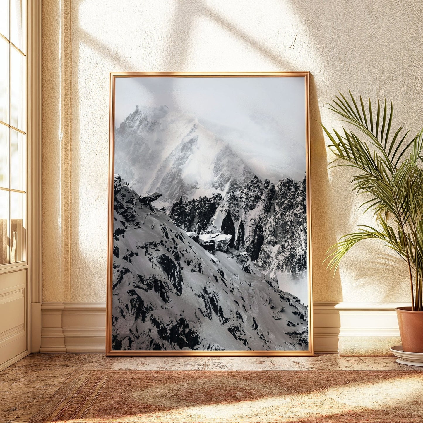 Alpine mountain ridge with jagged peaks in a snowy landscape, framed in a contemporary setting.