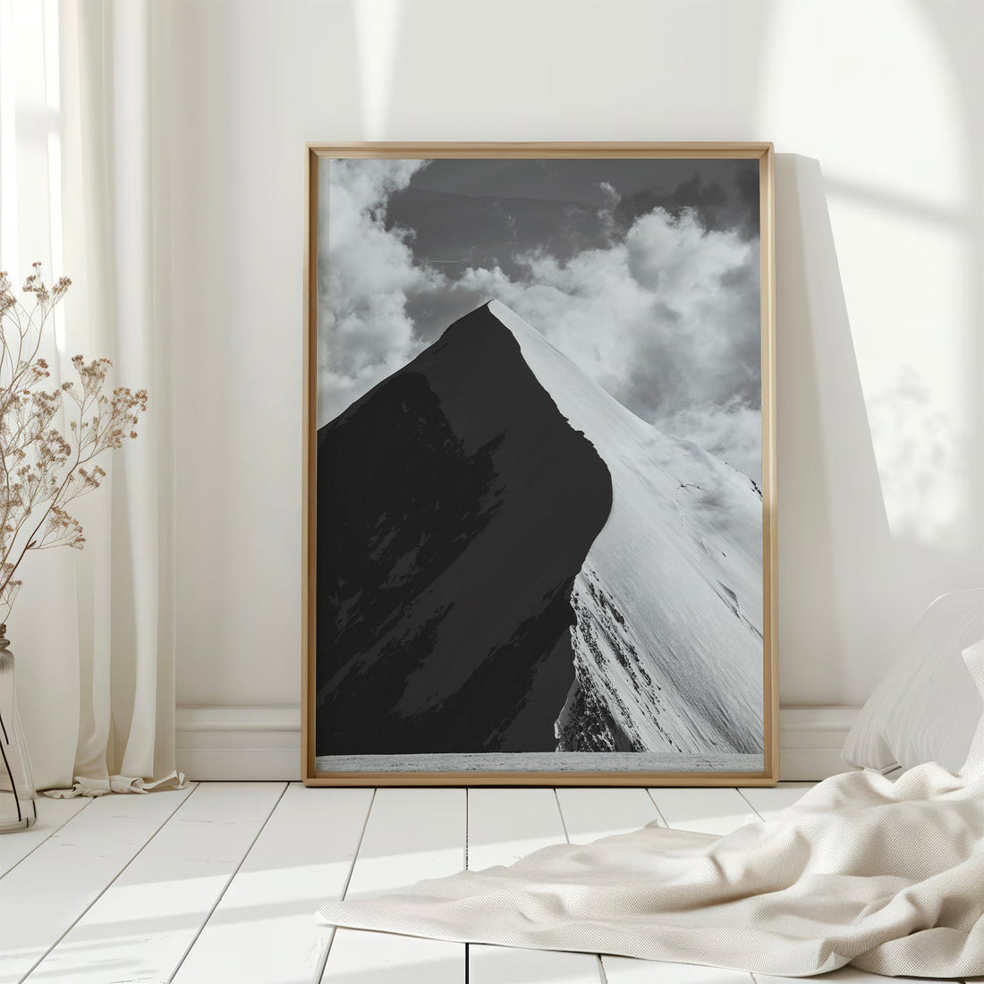 A mesmerizing fine art photography print of a towering Alpine peak under dramatic skies.