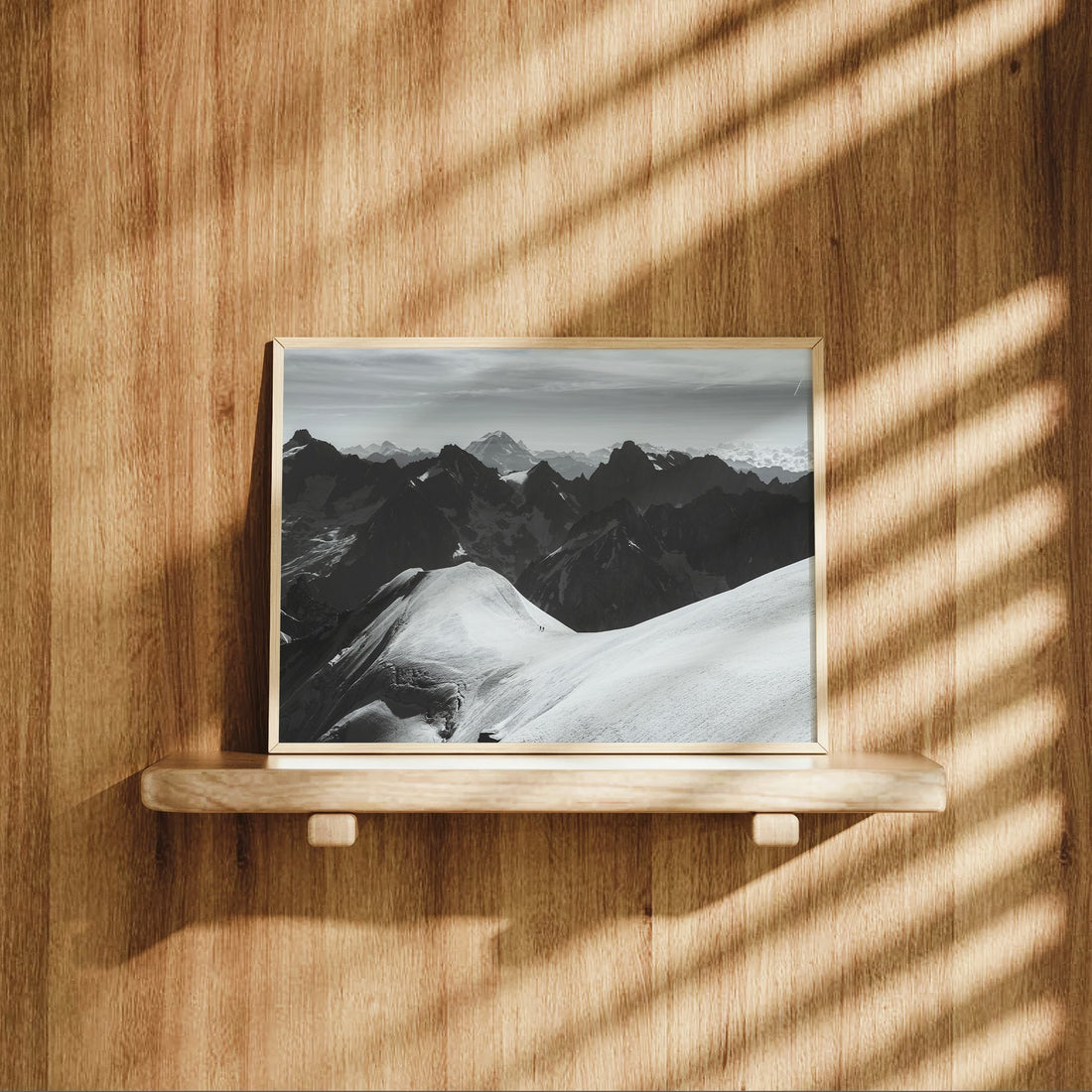Striking fine art photo print of a narrow alpine ridge surrounded by jagged Chamonix peaks.