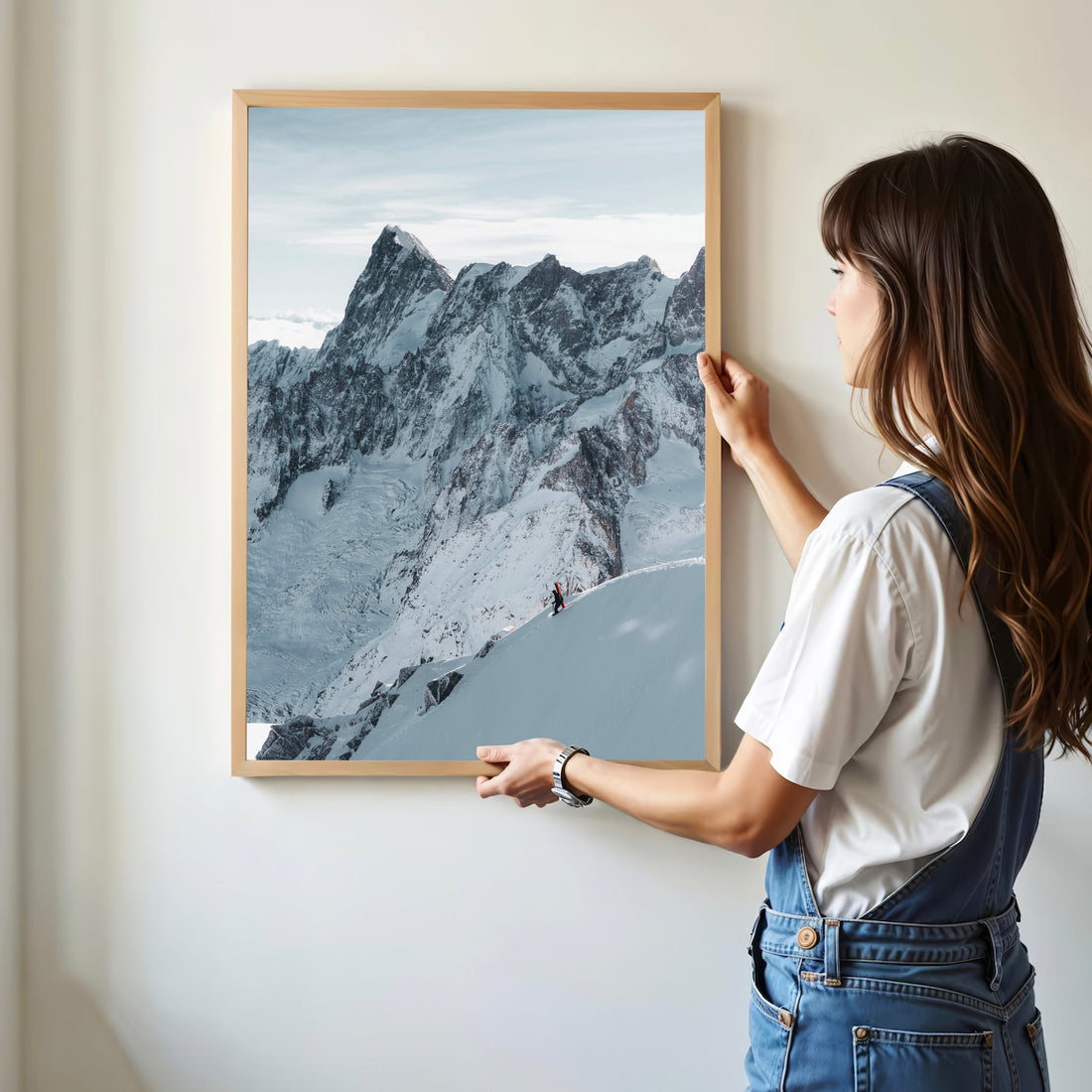 A fine art print featuring a high-altitude ski mountaineer descending the steep Midi Arete ridge.
