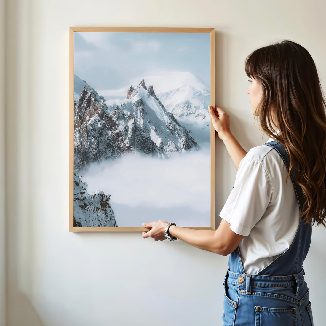 A mesmerizing alpine summit photography print of Aiguille du Midi rising above the clouds.