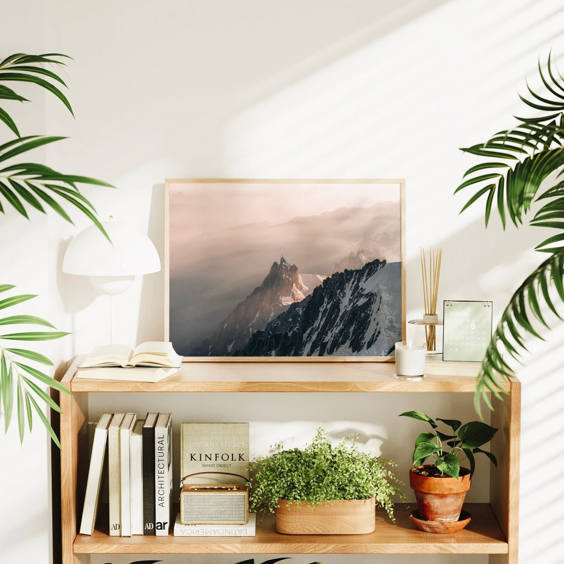 Alpine photography print featuring sunset light breaking through clouds over Aiguille du Midi in Chamonix.
