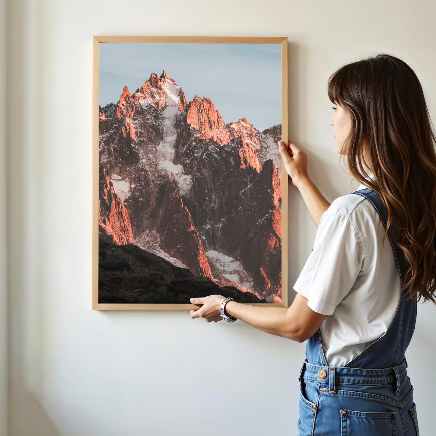 Beautiful fine art print of an alpine sunset over the Aiguille de Chamonix, with warm, glowing light on snowy peaks.