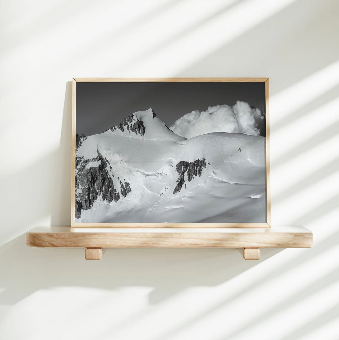 Premium alpine wall art featuring a crisp, high-contrast black and white photo of Mont Maudit.