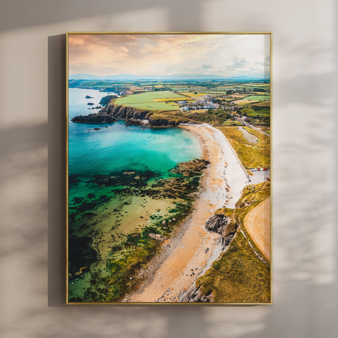 Aerial view of Annestown Beach in Ireland with turquoise waters and golden sand