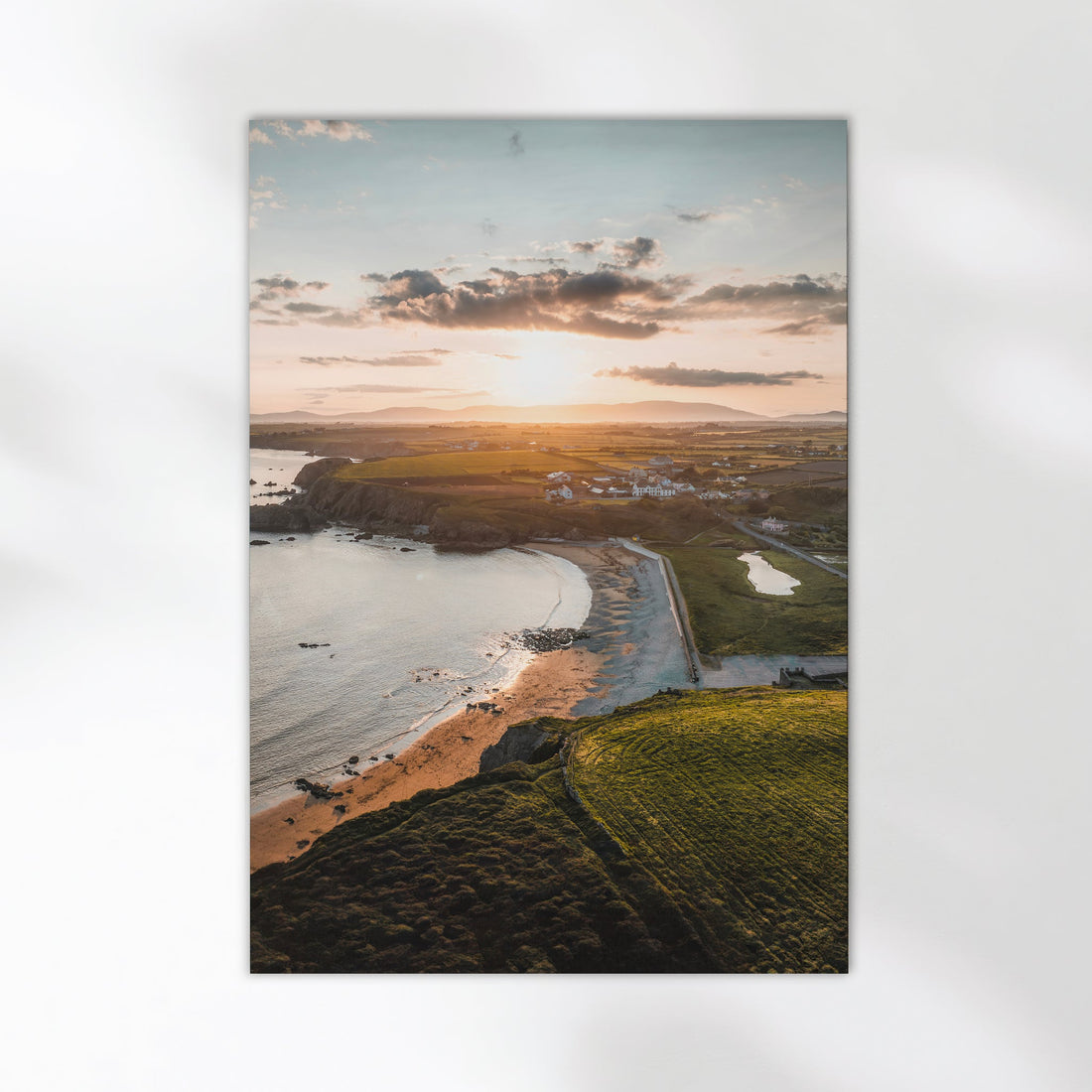 Unframed aerial print of Annestown Beach, Ireland, with warm sunset tones