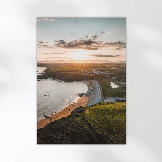 Unframed aerial print of Annestown Beach, Ireland, with warm sunset tones
