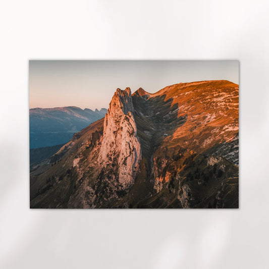 Fine art print of the Appenzell Alps at sunrise, showcasing Saxer Lücke’s jagged ridge in warm tones.