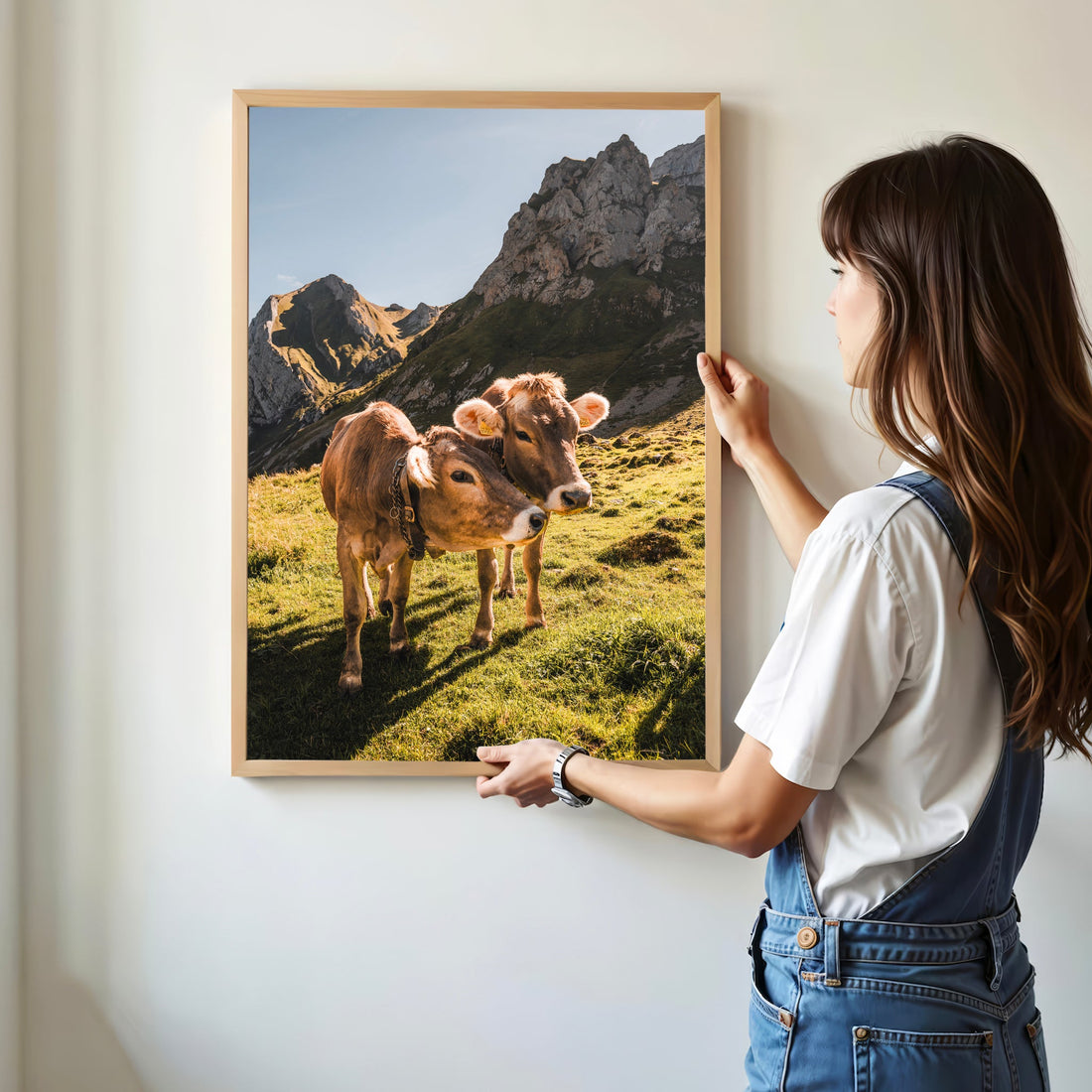 Scenic landscape print of Appenzell's rolling hills with two Alpine cows in the foreground.