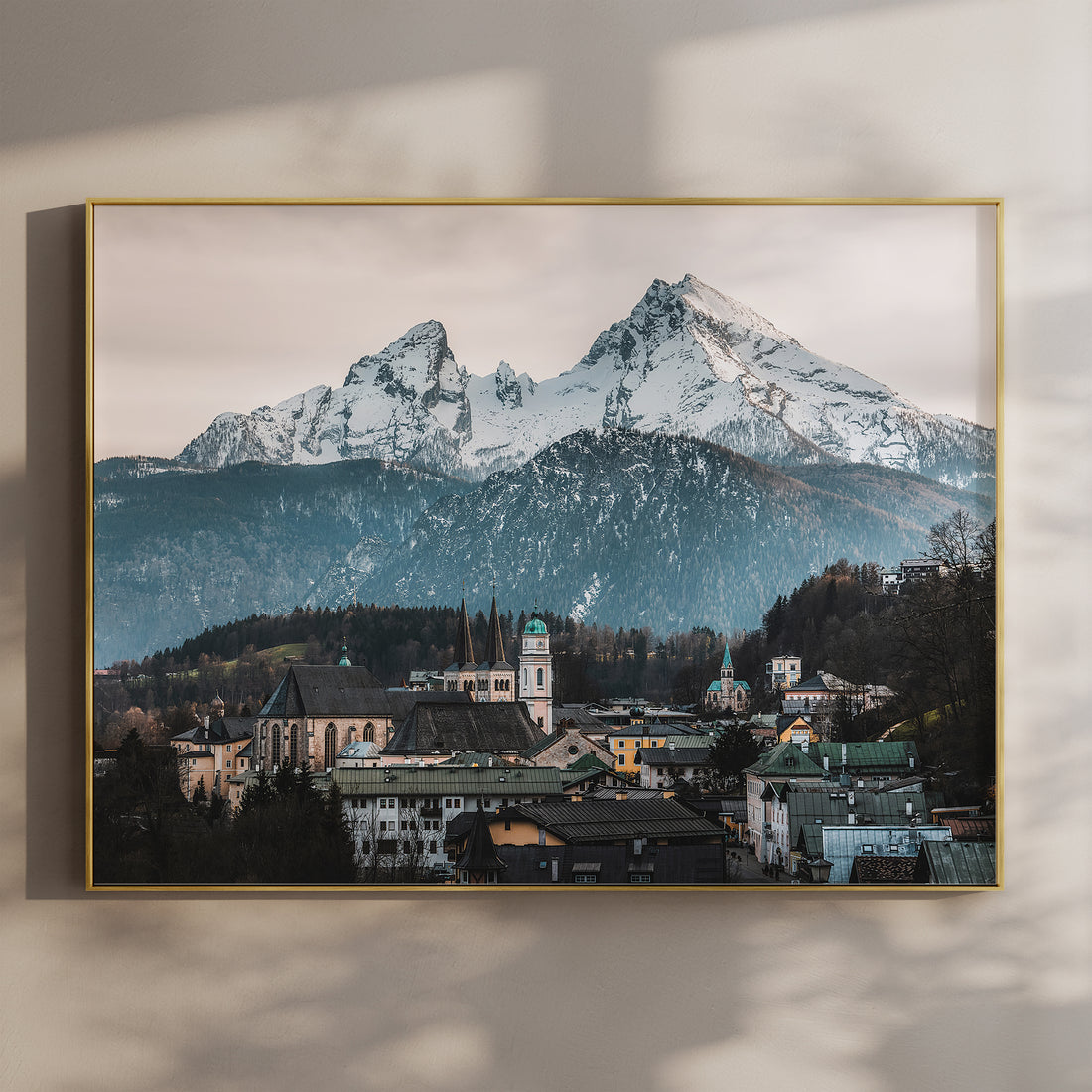 Snow-covered Watzmann mountain rising above Berchtesgaden town in Bavaria