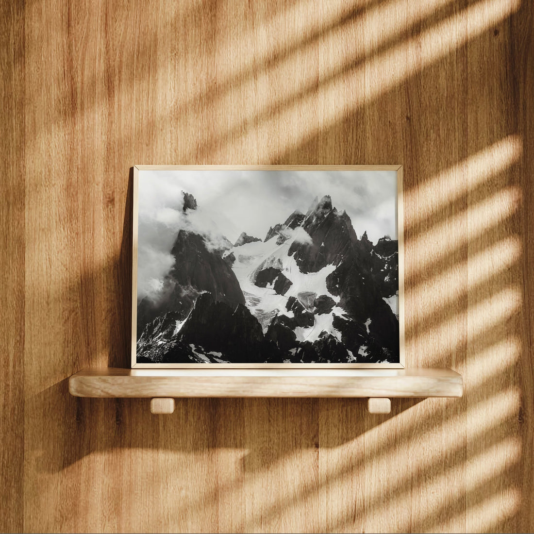 Striking black and white Alps landscape print of Chamonix’s rugged mountain skyline and dramatic weather.