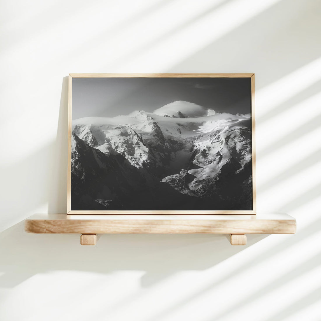Timeless black-and-white photography of Mont Blanc Massif, highlighting the beauty of the Alps.