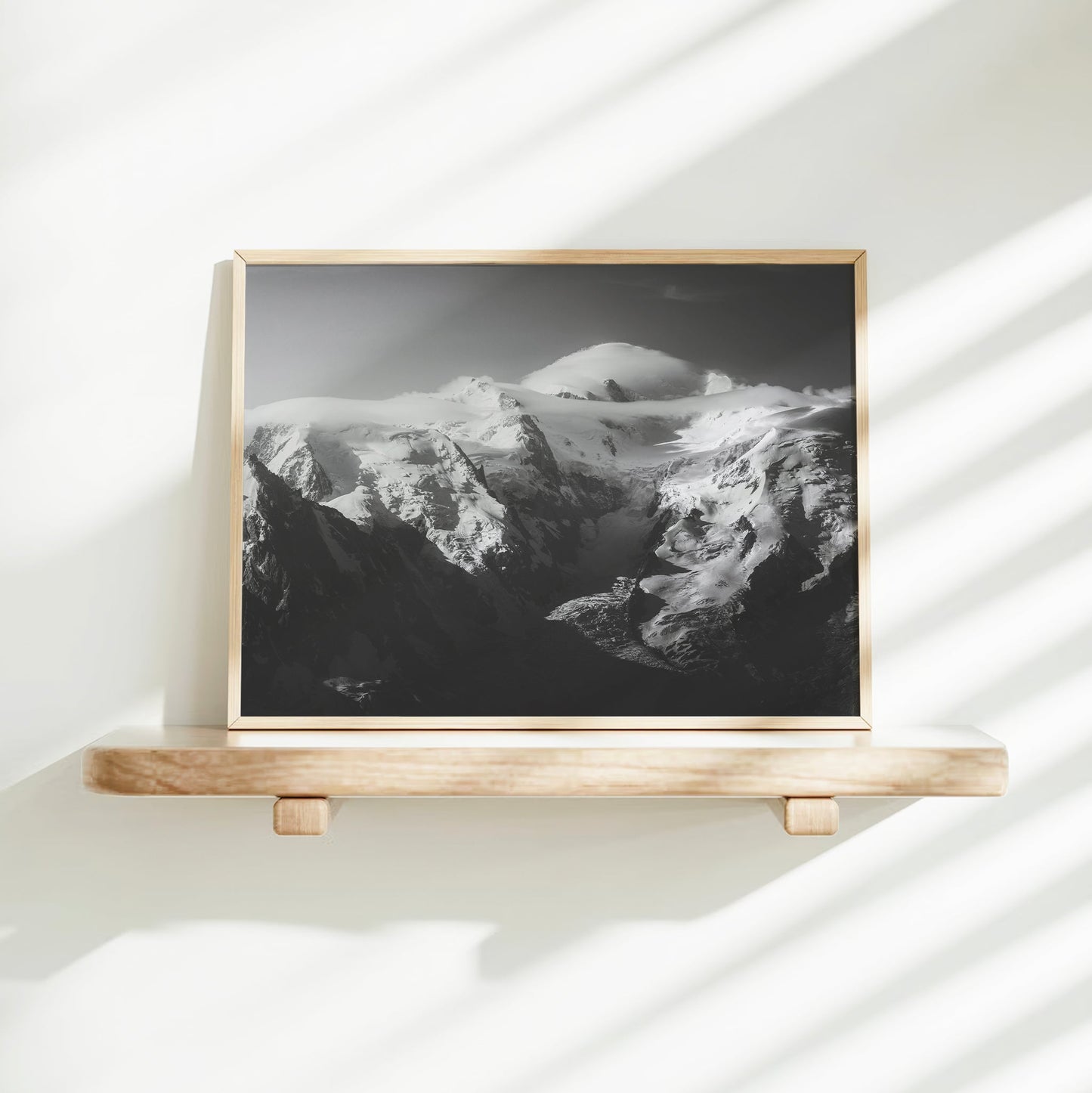Timeless black-and-white photography of Mont Blanc Massif, highlighting the beauty of the Alps.