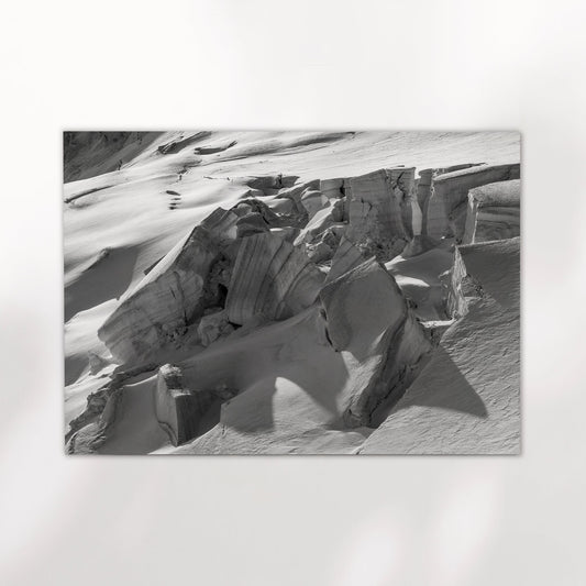 Minimalist black and white glacier wall art print highlighting the raw textures of the French Alps.