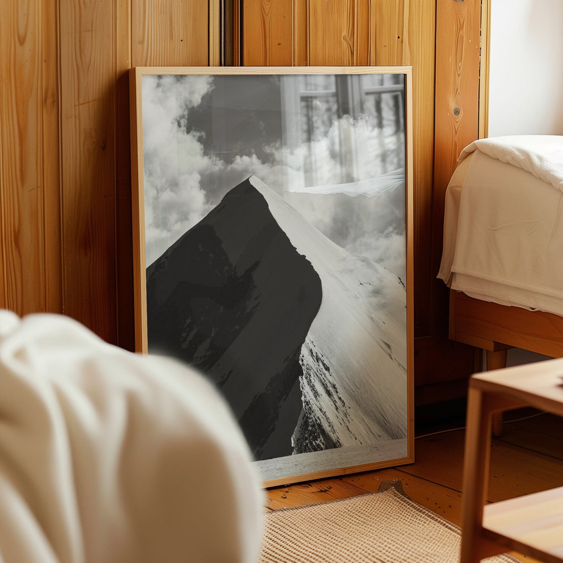 Minimalist black and white Alps mountain wall art showcasing breathtaking peaks and moody clouds.