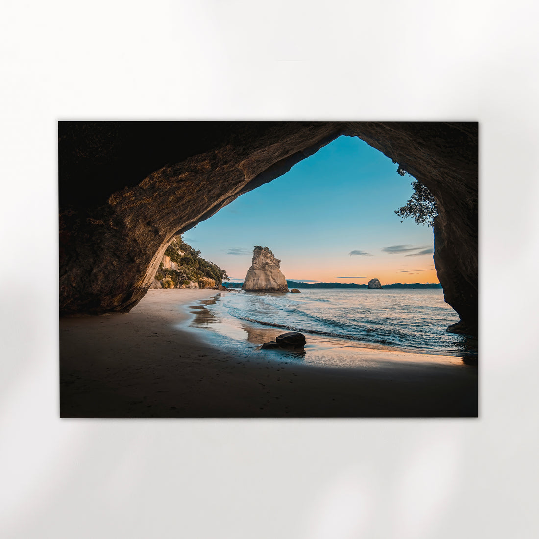 Unframed Cathedral Cove fine art print on white background showing iconic rock arch framing Te Hoho Rock and sandy beach at sunrise
