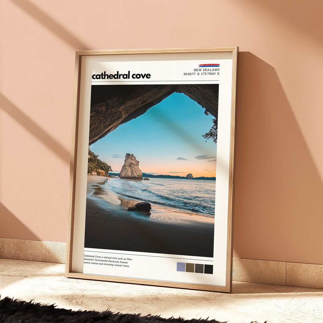 Cathedral Cove wall art print leaning against a wall in warm morning light