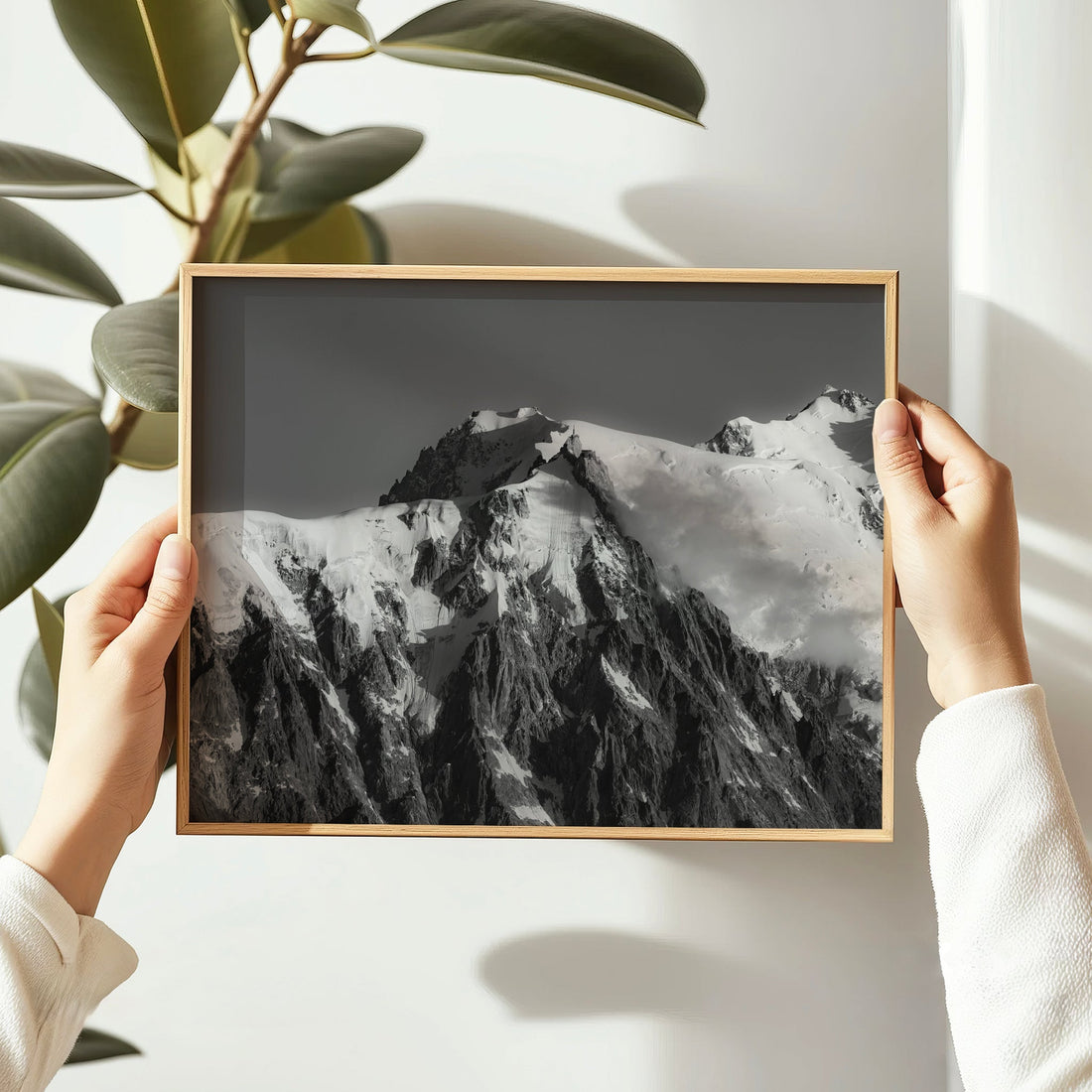Chamonix photography print of Aiguille du Midi's rugged slopes with a sharp contrast of snow and granite.