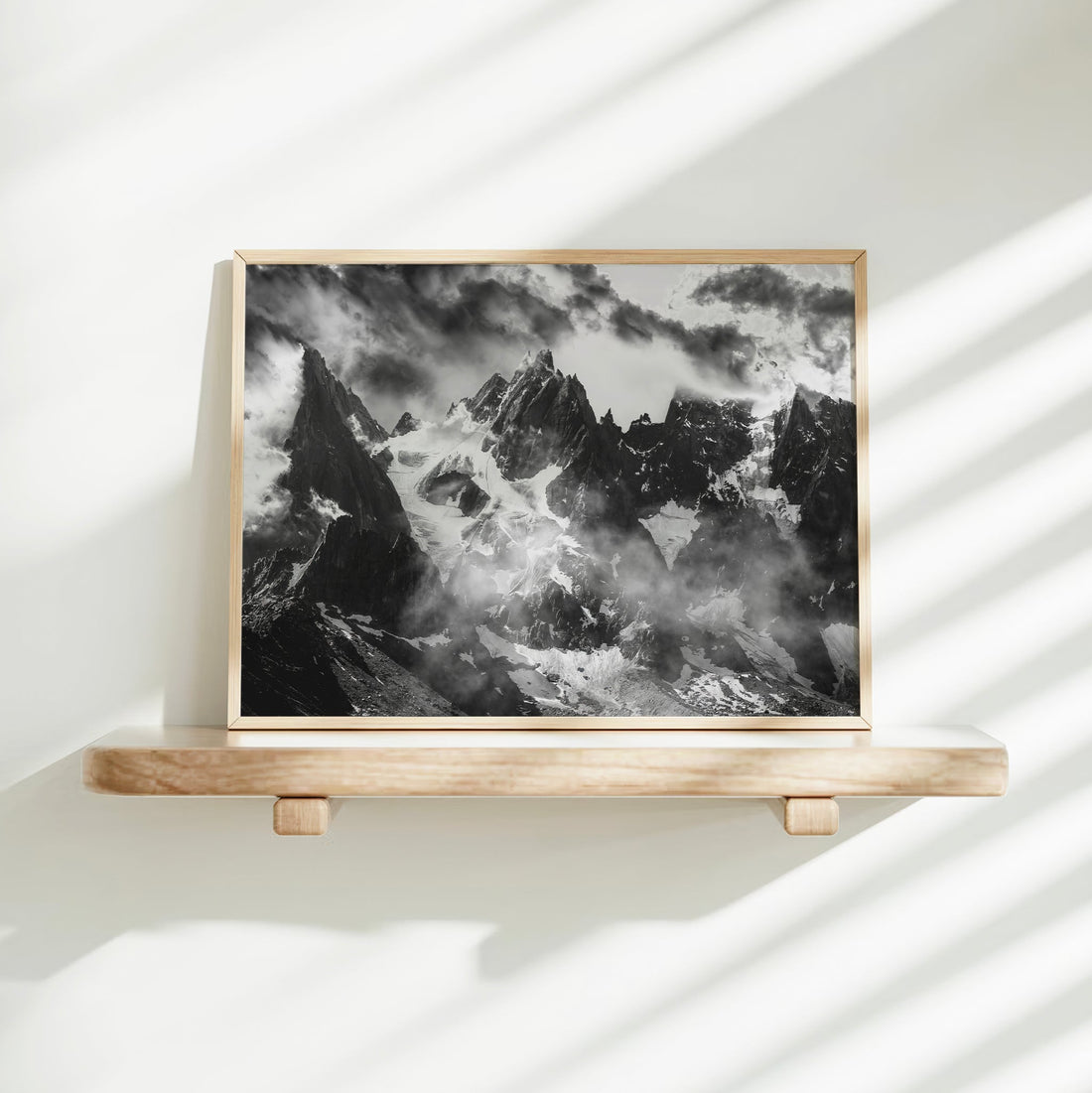 Moody Chamonix Aiguilles wall decor showing dramatic alpine summits in a cinematic black and white finish.