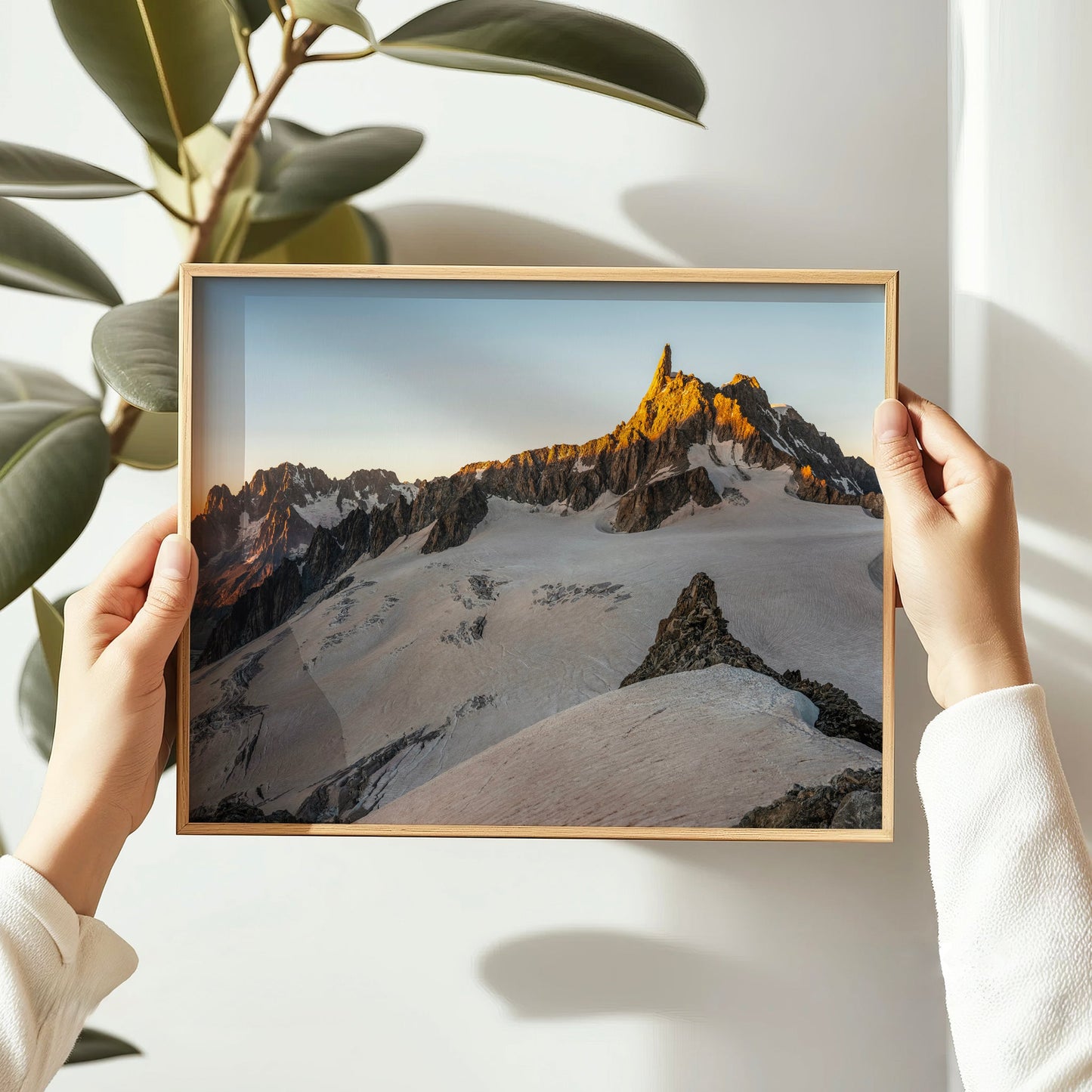 Chamonix wall art print showing Dent du Géant glowing orange in the sunset over alpine glaciers.