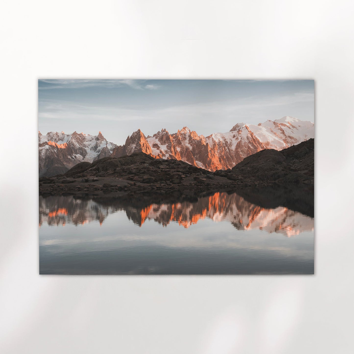 Chamonix photography print capturing Lac Blanc with fiery mountain reflections and a pastel alpine sky.