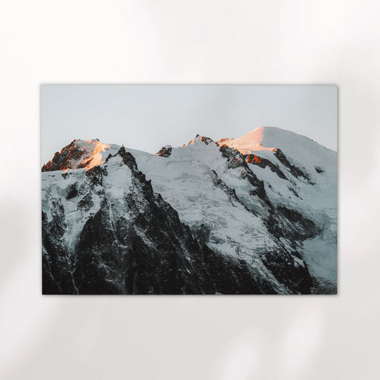 Stunning snowy ridge of Mont Blanc Massif captured in golden evening light for French Alps wall art.