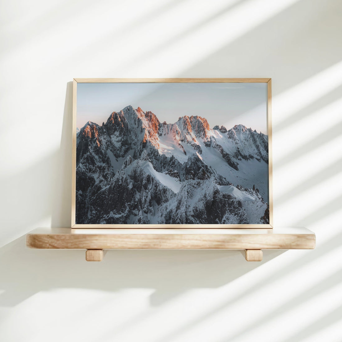 Stunning wall art print showcasing Chamonix’s mountain peaks glowing with the first light of day in the Alps.