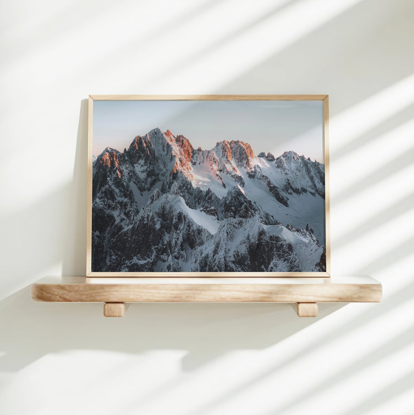Stunning wall art print showcasing Chamonix’s mountain peaks glowing with the first light of day in the Alps.