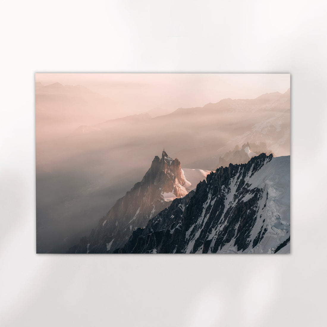 Fine art Chamonix photography print showing soft morning light cascading across alpine peaks in the French Alps.