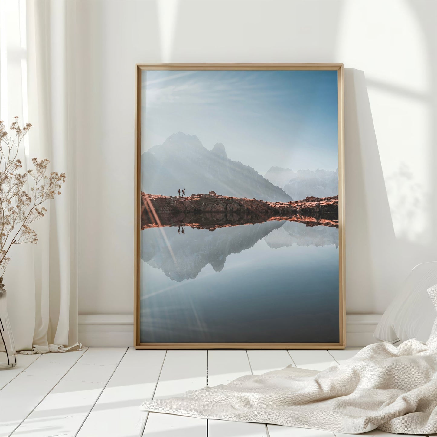 Chamonix glacial lake photography print featuring stunning mountain peaks mirrored in the water.