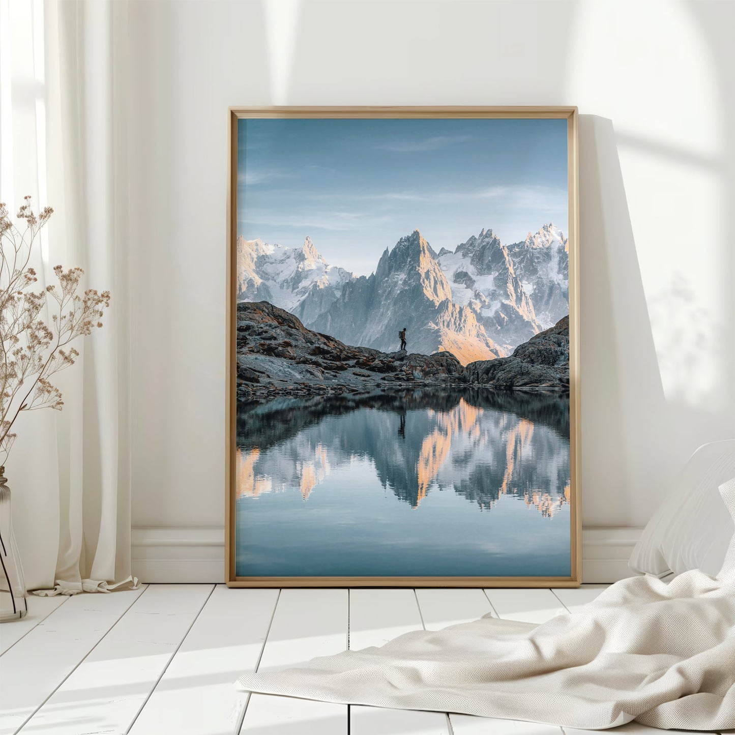 A mesmerizing glacier-fed lake in Chamonix, framed by rugged mountain peaks and golden light.