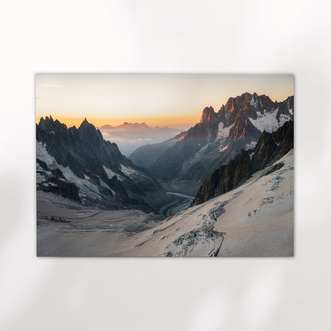 Chamonix glacier wall art print featuring a sweeping view of the Mer de Glace valley at golden hour.