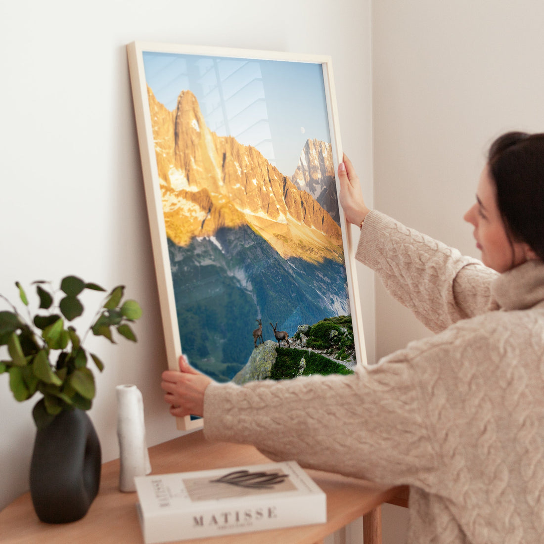 Chamonix ibex scenic wildlife art print featuring two ibex perched on a rocky ledge in the golden hour.